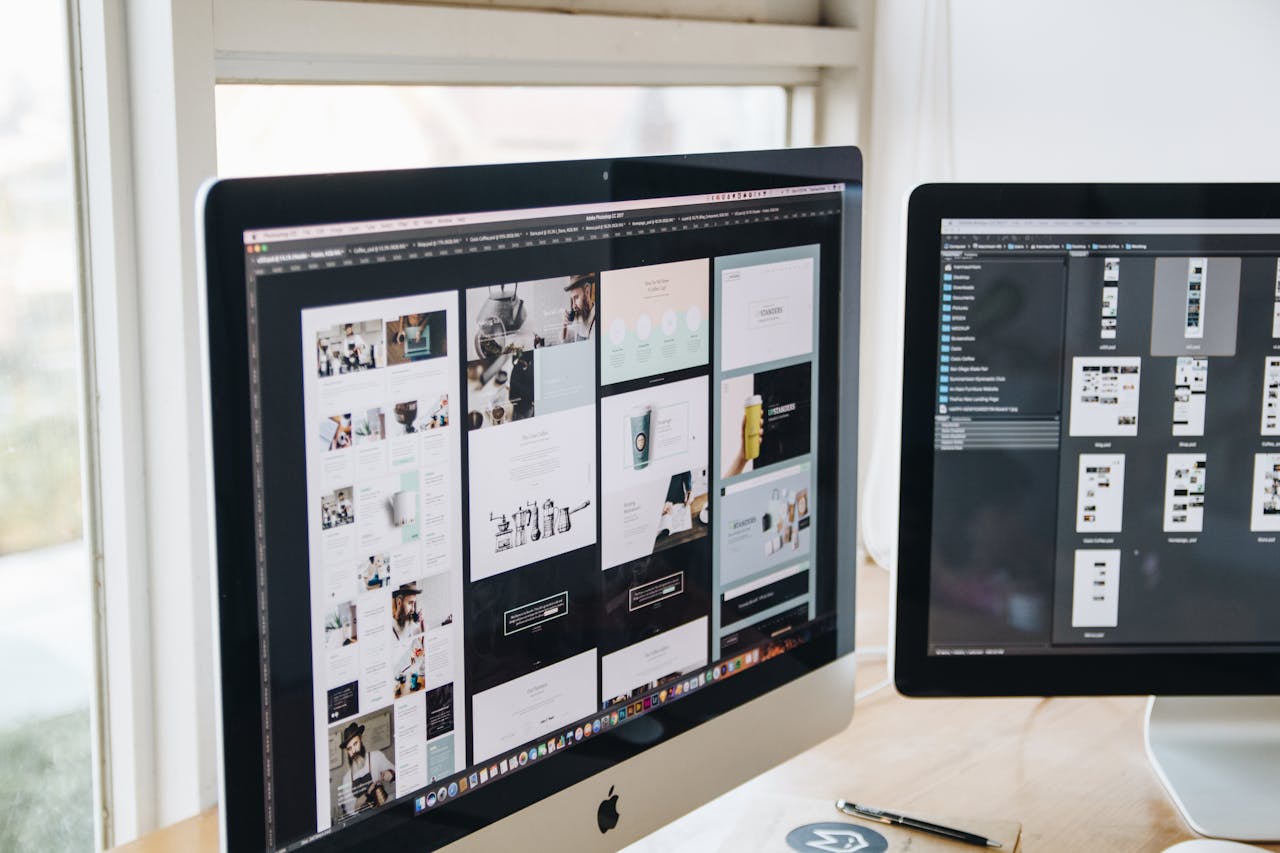hero-img Modern office desk setup with dual monitors displaying design software, ideal for tech and business themes.